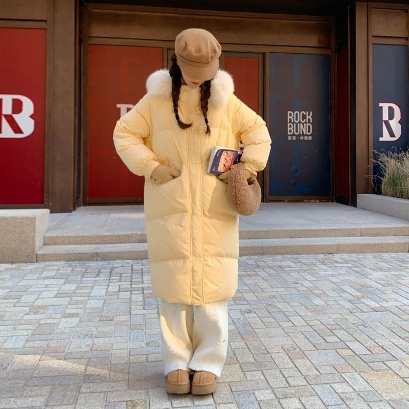 Doudoune longue femme à capuche et fausse fourrure – Hiver