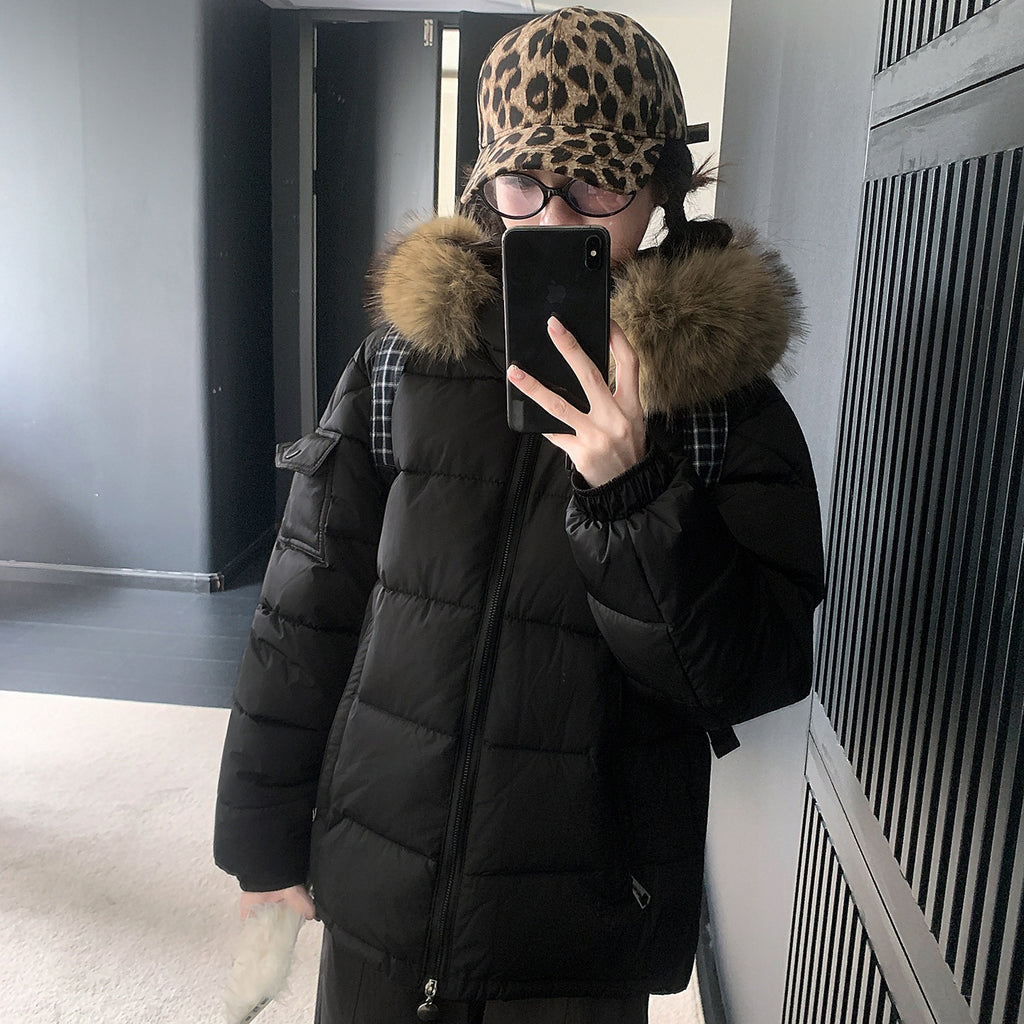 Doudoune femme d’hiver à capuche et grande fausse fourrure amovible
