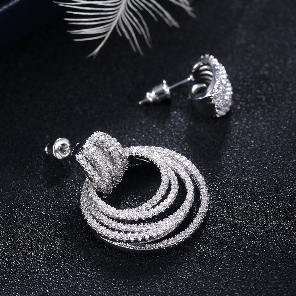 Boucles d’oreilles pendantes à anneaux superposés – Style élégant