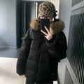 Doudoune femme d’hiver à capuche et grande fausse fourrure amovible